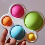Jouet Sensoriel à Bulles de Poussée Montessori – 5 Bulles Silicone, Motricité Fine | TrioNest™