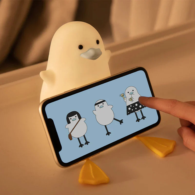 Veilleuse Mouette Silicone Bébé – Lumière Douce, Arrêt Auto 20 min, Support Téléphone | TrioNest™